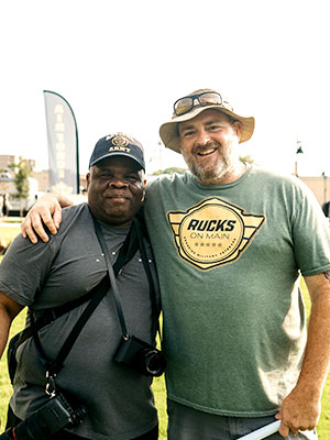 Two veteran men side by side facing the camera