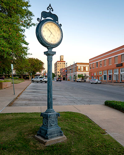 Shot of a standing vintage clock in the downtown portion of Temple