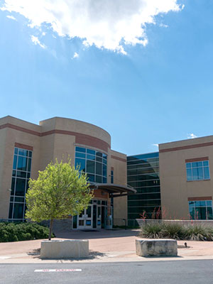 Business building with tree in front